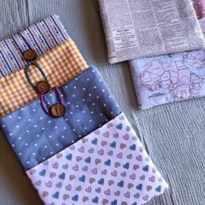 Funda para libro. Acolchada con botón
